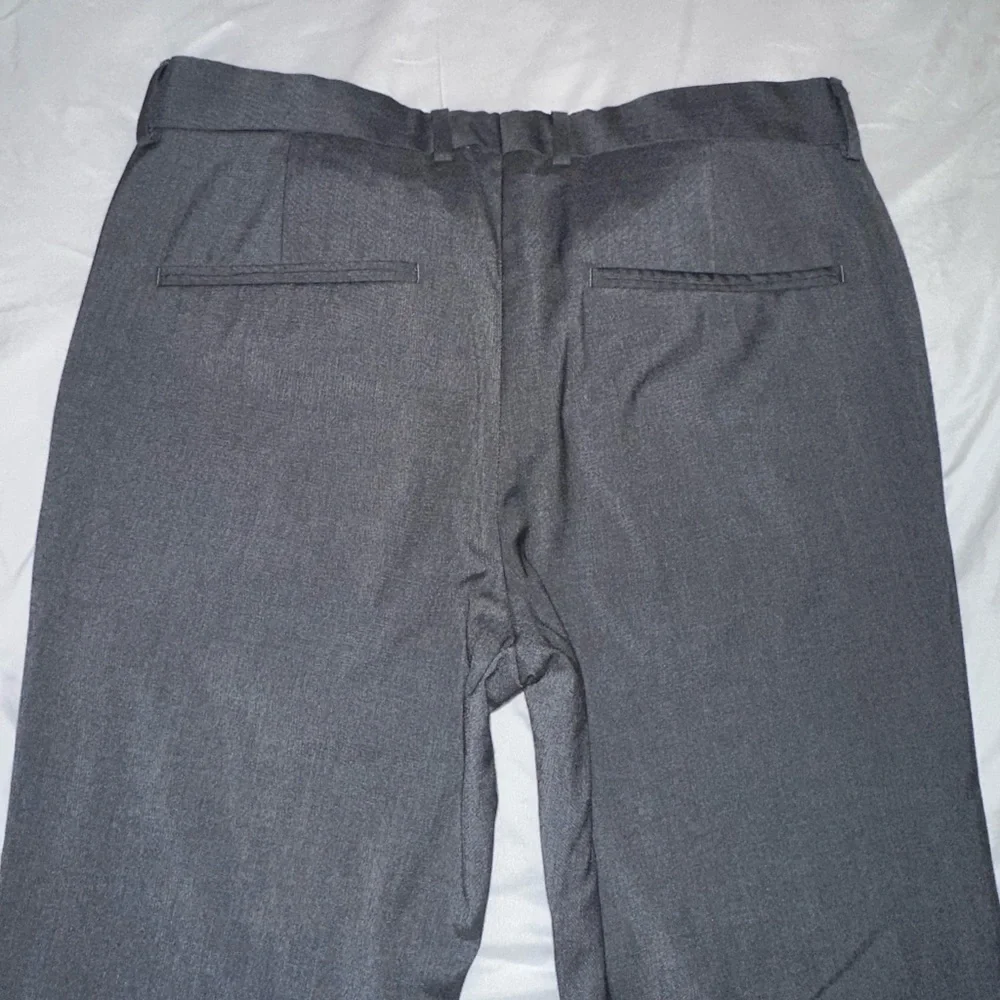 H&M slim fit suit pants, dark grey, size 33R (US).